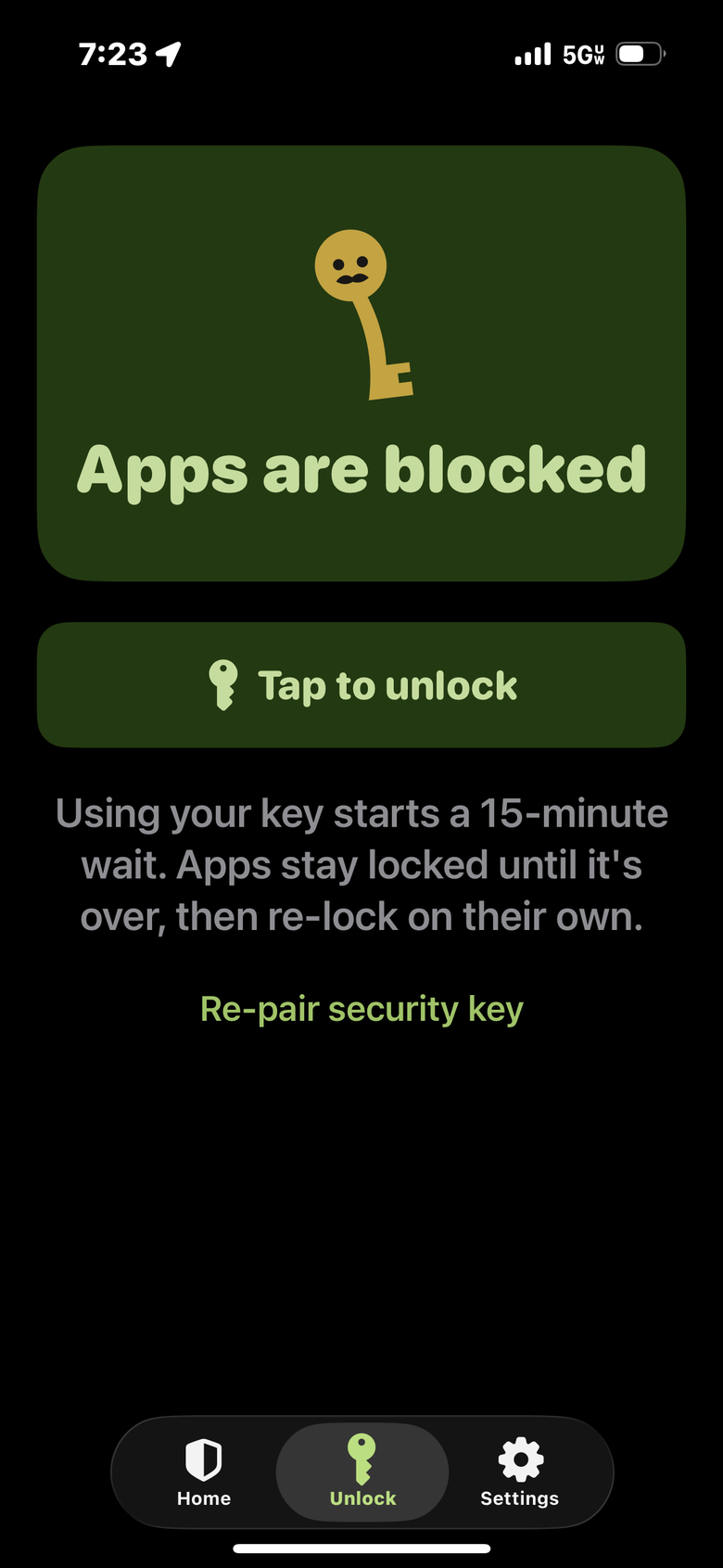 Pawl app screen. The key mascot stands in a green box above the words Apps are blocked. Below it a Tap to unlock button, and the line: Using your key starts a 15-minute wait. Apps stay locked until it's over, then re-lock on their own.